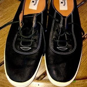Black converse shoes size 11.5US leather with there laces circa 2011